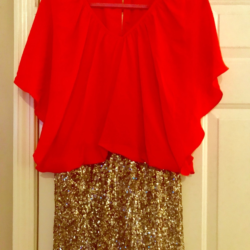 CLUCE orange & sequined above knee cocktail dress.